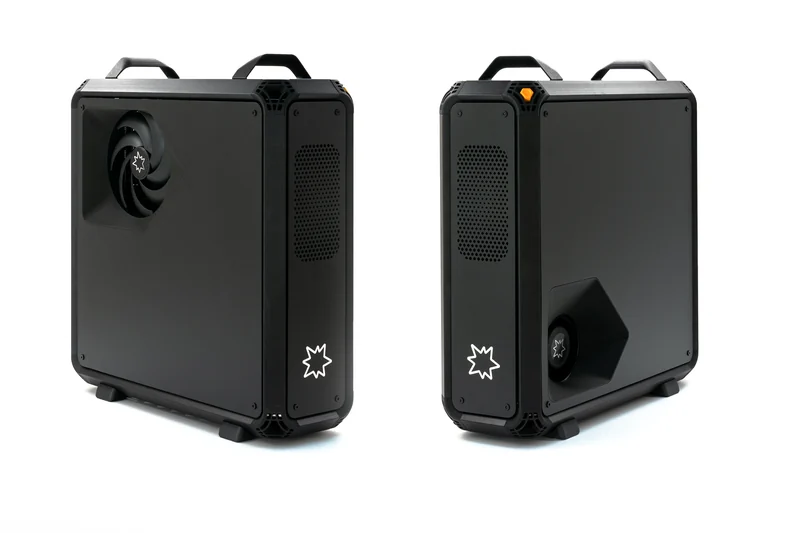 Two Lucebox workstations side by side, one showing its fan side, one its front