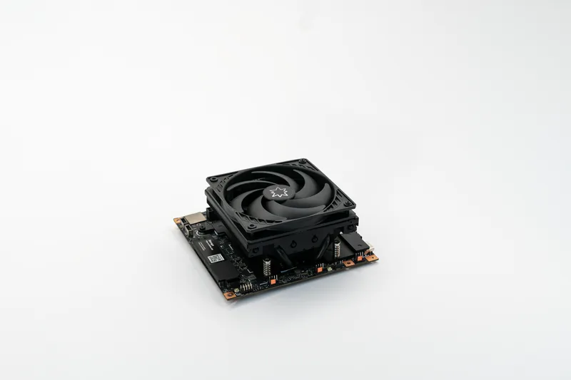 The Strix Halo compute board with its 120 mm cooler mounted